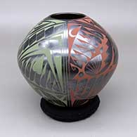 Polychrome jar with a geometric design
 by Jesus Lozano of Mata Ortiz and Casas Grandes