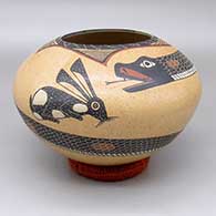 Polychrome jar with a sgraffito and painted rattlesnake, rabbit, and geometric design
 by Roberto Banuelos of Mata Ortiz and Casas Grandes