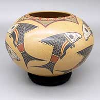 Polychrome jar with a sgraffito and painted fish and geometric design
 by Roberto Banuelos of Mata Ortiz and Casas Grandes