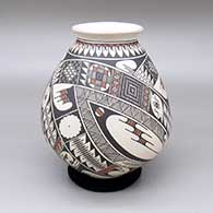 Polychrome jar with a flared opening and a geometric design
 by Gabino Ledezma of Mata Ortiz and Casas Grandes