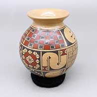 Small polychrome jar with a flared opening and a cuadrillos and geometric design
 by Macario Ortiz of Mata Ortiz and Casas Grandes