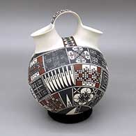 Polychrome wedding vase with a geometric design
 by Jose Luis Loya of Mata Ortiz and Casas Grandes
