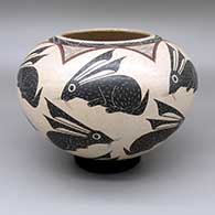Polychrome jar with a sgraffito and painted rabbit and geometric design
 by Roberto Banuelos of Mata Ortiz and Casas Grandes