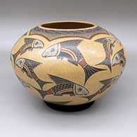 Polychrome jar with a sgraffito and painted fish and geometric design
 by Roberto Banuelos of Mata Ortiz and Casas Grandes
