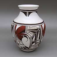 Polychrome jar with a flared opening and a four-panel geometric design
 by Marianne Navasie of Hopi