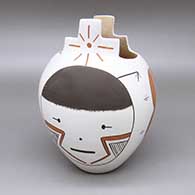 Polychrome jar with a kiva step geometric cut opening and a painted face, sun, and geometric design
 by Chris Teller of Isleta