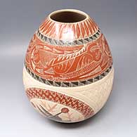 Polychrome jar with sgraffito and painted crow, lizard, branch, and geometric  design
 by Eleuterio Pina of Mata Ortiz and Casas Grandes