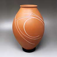 A polychrome jar with an everted rim and a geometric design
 by Diego Valles of Mata Ortiz and Casas Grandes