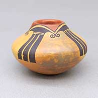 Small polychrome jar with fire clouds and a painted geometric design
 by Rachel Sahmie of Hopi