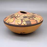 Polychrome jar with an organic opening, fire clouds, and a painted bird and geometric design
 by Jacob Koopee of Hopi