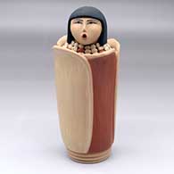 A polychrome Corn Maiden figure
 by Laura Gachupin of Jemez