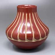 A red water jar carved with a band-of-feathers design
 by Denise Chavarria of Santa Clara