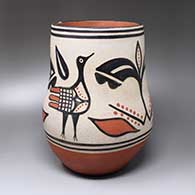 A polychrome jar decorated with a four-panel bird, plant and geometric design
 by Mary Edna Tenorio of Santo Domingo