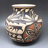 A polychrome jar with an everted rim and a rosette, deer-with-heart-line and geometric design
 by Anderson Peynetsa of Zuni