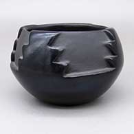 Black bowl with a carved kiva step geometric design
 by Anita Suazo of Santa Clara