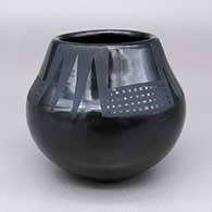 Small black-on-black jar with a geometric design
 by Maria Martinez of San Ildefonso