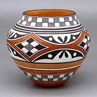 A polychrome jar decorated with bands of geometric design
 by Rebecca Lucario of Acoma