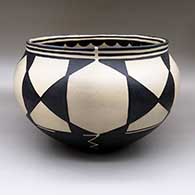 Large polychrome jar with a geometric design on side and interior
 by Robert Tenorio of Santo Domingo