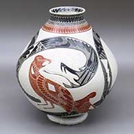 A polychrome jar decorated with a sgraffito and painted two-panel serpent, bird and geometric design
 by Eduardo Quintana of Mata Ortiz and Casas Grandes