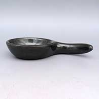 Black dish with handle
 by Rose Gonzales of San Ildefonso