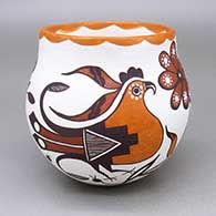 Small polychrome jar with a parrot, flower, and geometric design
 by Diane Lewis of Acoma