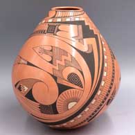 Polychrome jar decorated with a 2-panel geometric design
 by Jorge Quintana of Mata Ortiz and Casas Grandes