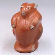 Red rabbit figure
 by Unknown of Cochiti