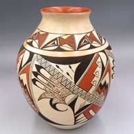 Polychrome jar with a flared lip and a 4-panel bird-hanging-from-sky-band and geometric design
 by Fawn Navasie of Hopi