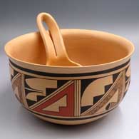 Polychrome bowl with a flared lip and an 8-panel geometric design with a plain salmon ladle
 by Karen Charley of Hopi