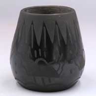 Black-on-black jar with a 4-panel raincloud and geometric design
 by Myra Little Snow of Santa Clara