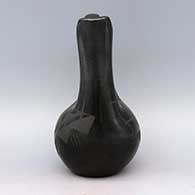 Black-on-black wedding vase decorated with a geometric design, click or tap to see a larger version