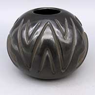 Black jar with carved geometric design
 by Anita Suazo of Santa Clara