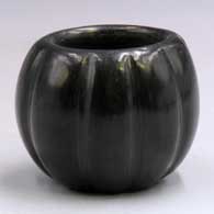 Miniature black jar carved with a melon designL16
 by Julia Martinez of Santa Clara