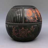 Black and red jar with carved feather geometric design and sgraffito dancer, sun face, turtle, lizard, insect, bear with heart line, and bear paw design, click or tap to see a larger version