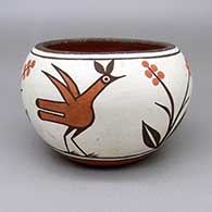 Small polychrome bowl with a three-panel roadrunner and flower design
 by Candelaria Gachupin of Zia