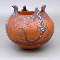 Polychrome jar with an applique and painted lizard design
 by Anderson Peynetsa of Zuni