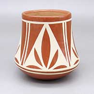 Red-on-red jar with a four-panel geometric design
 by Albert and Josephine Aguilar of San lldefonso