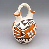 Polychrome wedding vase with braided handle and chicken, flower, fine line, and geometric design
 by Unknown of Acoma