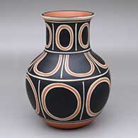 A polychrome water jar decorated with three bands of geometric design
 by Thomas Tenorio of Santo Domingo