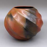 Red swirl melon jar with ten ribs and fire clouds
 by Samuel Manymules of Dineh