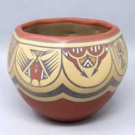 Polychrome jar with 8 facets, each with a separate design
 by Margaret and Luther Gutierrez of Santa Clara