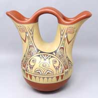 Polychrome wedding vase with Yei, bird element and geometric design
 by Margaret and Luther Gutierrez of Santa Clara