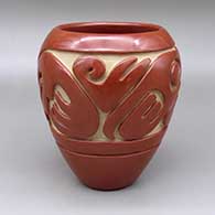 Red jar with a carved geometric design
 by Teresita Naranjo of Santa Clara