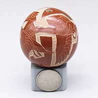 Click for a larger view A miniature red seed pot decorated with a sgraffito flying geese and geometric design
by Forrest Naranjo of Santa Clara