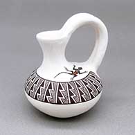 Small polychrome pitcher with a lizard, fine line, and geometric design
 by Rebecca Lucario of Acoma
