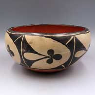 Polychrome dough bowl polished inside with a painted 6-panel geometric design
 by Unknown of Santo Domingo
