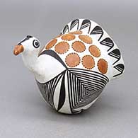 Small polychrome turkey figure with a fine line geometric design
 by Lucy Lewis of Acoma