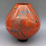 Black and brown jar with geometric design and inlaid stones
 by Taurina Baca of Mata Ortiz and Casas Grandes