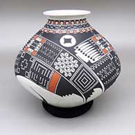 Polychrome jar with a flared opening and a geometric design
 by Noe Quezada of Mata Ortiz and Casas Grandes
