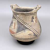 Polychrome effigy jar with two faces and a painted geometric design
 by Juan Quezada Sr of Mata Ortiz and Casas Grandes
